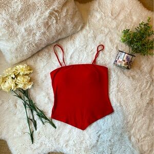 Lightly padded red tank top in women’s small.